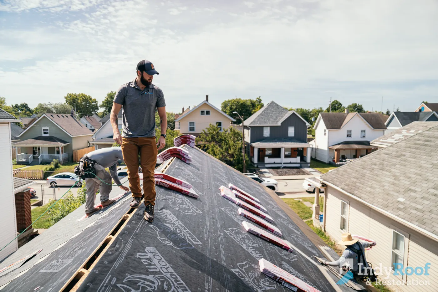 Tarping and dry-in on a West College Corner commercial roof